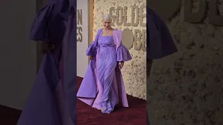 Helen Mirren, 78, hits the red carpet in a bizarre a purple gown with dramatic coat