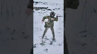 Ukrainian Soldier performs Pikachu dance on battlefield amidst explosions and gunfire.