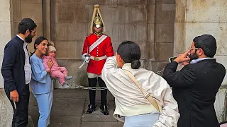 IMPATIENT TOURIST PUSHES IN AFTER ONE GROUP MONOPOLISE the King's Guard at Horse Guards!