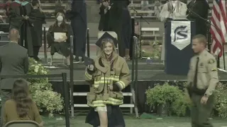 Daughter of firefighter killed at Station 81 wears father's jacket to high school graduation