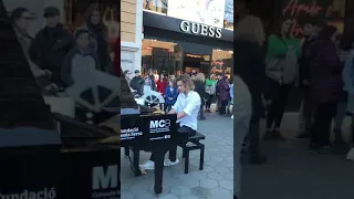 PLAYING REQUIEM FOR A DREAM IN THE STREETS OF BARCELONA
