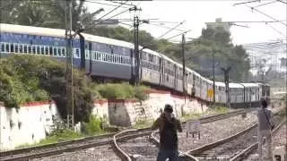 TRAIN DESCENDS A FLY-OVER ( INDIAN RAILWAYS)