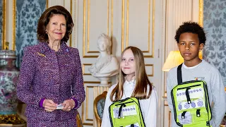 Queen Silvia of Sweden launches Mayflower sales with school kids