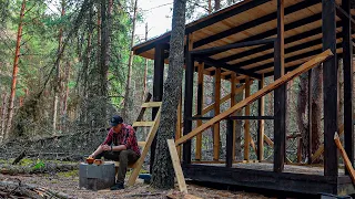 House building in the woods, off grid house