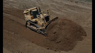 CAT D10T Dozer | Pushing soil for Screening