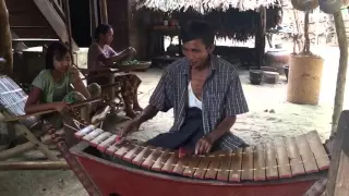 MYANMAR (BURMA): A local artist performing burmese xylophone in a traditional village