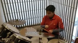 Neil playing 2/4 on the drum