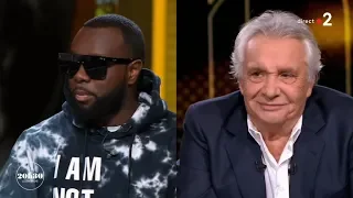 Michel Sardou et Gims invités de Laurent Delahousse