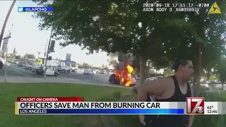 LAPD officers save man from burning car