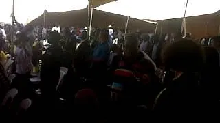 Crowds sing a Mandela praise song after Jacob Zuma's speech