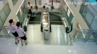 Mother killed in escalator incident