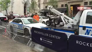 "MUST SEE TO BELIEVE" - NYPD TOW TRUCK ALMOST TOWING AWAY A NYPD CRUISER DURING PRES. OBAMA'S VISIT.