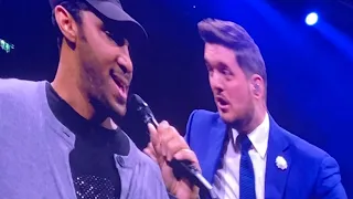 Michael Bublé sings with fan (Richy Brown)