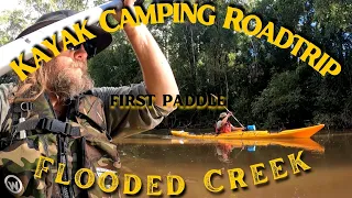 Kayak Car Camping Road Trip . Paddling a flooded Creek on the Mid North Coast Australia