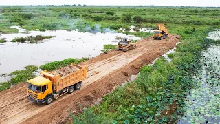 Good Hands Operator Powerful Bulldozer Dump Truck High Level Operated New Road Construction In Lake