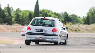 Circuit de Calafat. Peugeot 206 gti vs. BMW 325i e36.