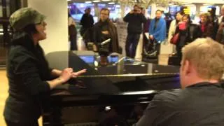 Kat Perkins Sings "Someone Like You" by Adele in Amsterdam Airport