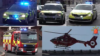 Police cars, Fire Trucks and Ambulances responding to calls in Belfast