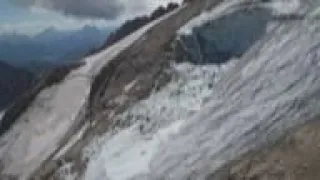 Rescuers search for hikers after avalanche in Italy