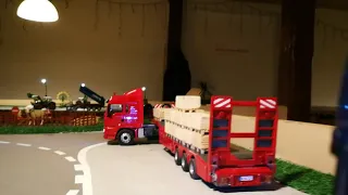 RC Siku - driving a Scania truck on the streets of a diorama,  scale 1:32