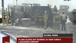 Plane slides off runway at New York's LaGuardia airport