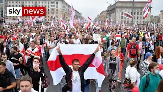 Tens of thousands of protesters flood the streets of Minsk