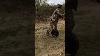 Solder rides electric one wheel bike in war