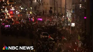 Pro-Palestinian demonstrators gather in NYC amid Rockefeller tree lighting