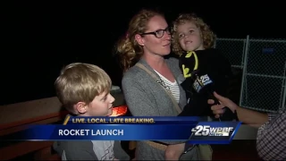 Rocket launch lights night sky