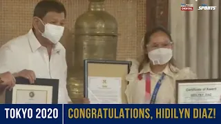 Hidilyn Diaz receives awards from government for the Philippines' first Olympic gold medal