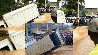 shocking!!!!!! 😱 MWIKI People  Swept by  Floods Rescuing a milk  Lorry.Nairobi flooding