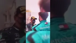 Lewis Hamilton Adjusting His Mechanic's Suit