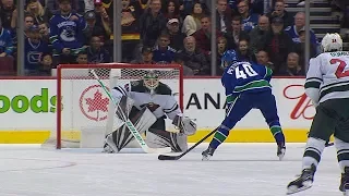 Elias Pettersson goes bar-down on a breakaway