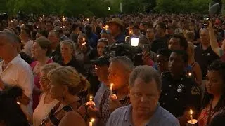 More than a thousand honor fallen Dallas officers at vigil