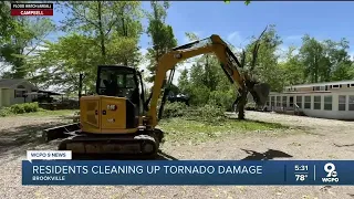 Southeast Indiana residents work to clean up damage after EF1 tornado