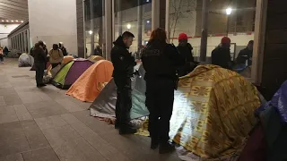 Paris Police evict migrants from makeshift camp in action decried as 'social cleansing'