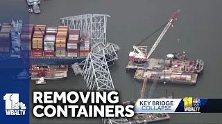 Crews work to remove containers from Dali ship, reopen channel