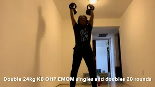 Double 24kg kettlebell overhead press singles and doubles workout by 66-years young middle-age man