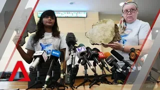 Debris suspected to be from MH370 handed to Malaysia