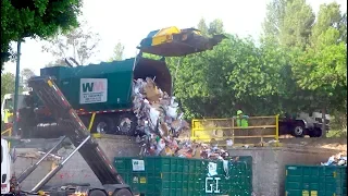 Waste Management Recycling Trucks Unloading