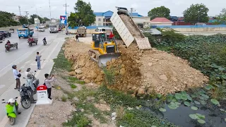 Great Project Landfill up with Operator Bulldozer Push Soil, Dump Truck Unloading Soil in Processing