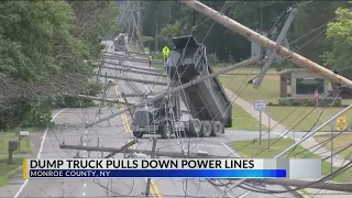 Dump Truck Pulls Down Power Lines