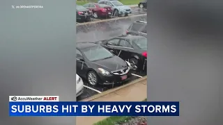 Strong storms bring heavy downpours, hail in suburbs