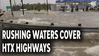 Raging water covering Eastex Fwy, Grand Pkwy