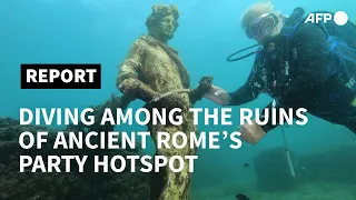 Diving among ancient ruins where Romans used to party | AFP