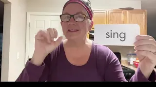 ASL sign for SING