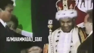 Ali presenting the crown to the newly crowned champ Mike Tyson