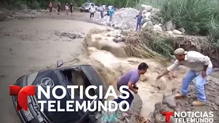 Inundaciones en Perú arrastran un auto con el conductor adentro | Noticias | Noticias Telemundo