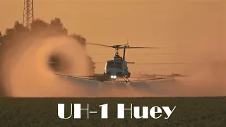 UH-1 Huey helicopter sunrise spraying N60901