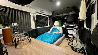 Car camping while being fanned by strong winds with a light car